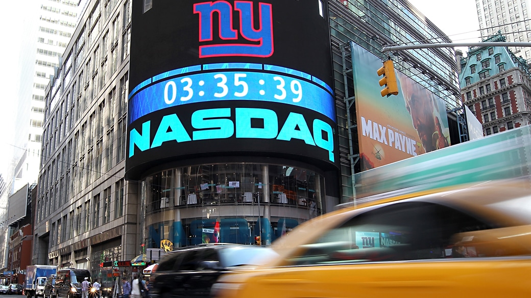 NEW YORK, NY - MAY 17:  Cars drive by the Nasdaq headquarters on May 17, 2012 in New York City. Facebook will list their IPO on Nasdaq on Friday morning with an opening price of $38 per share.  (Photo by Justin Sullivan/Getty Images)